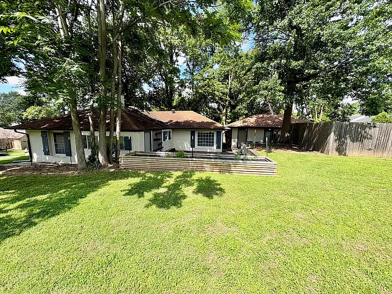 View of house and detached garage from west yard.