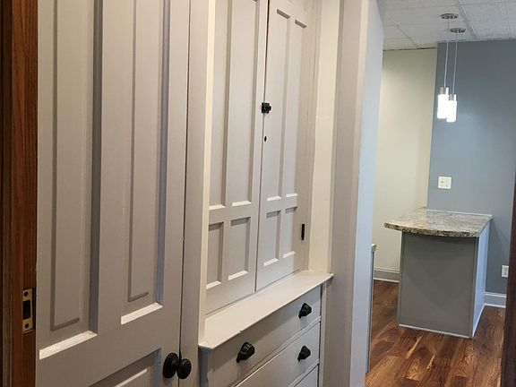 Apartment entry with ample storage.