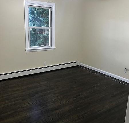 first floor bedroom,hardwood floors