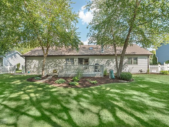 Fabulous, fenced backyard w/beautiful mature trees & plants!