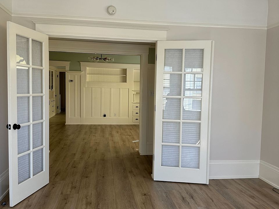 view from the front room to the middle room, doors can close to create a second front bedroom