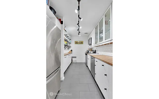 Sold by Douglas Elliman | media 16