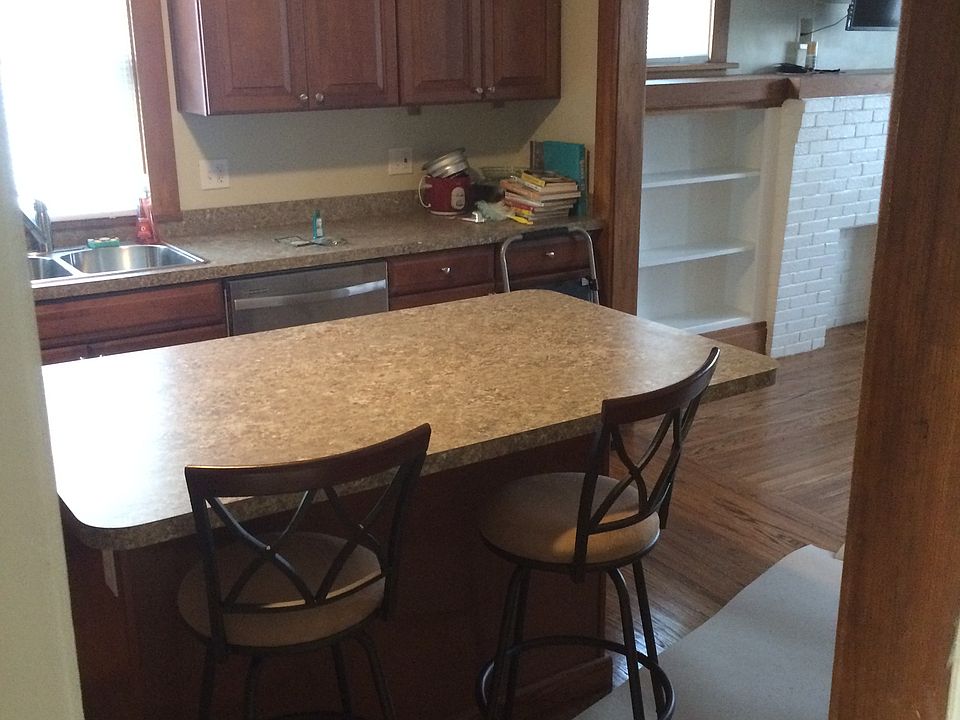 View from hallway to kitchen and living room