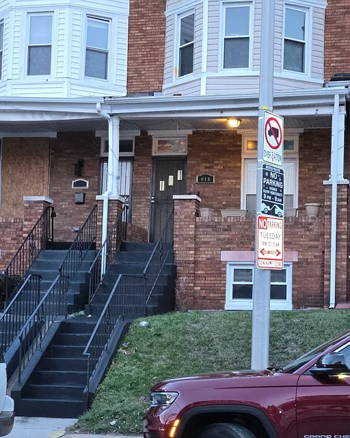 Front of home with Private Patio - 918 N Bentalou St