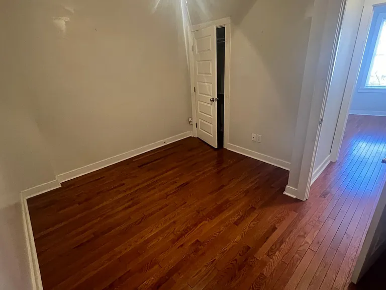 Bedroom 2 with hardwoods, closet and closet.