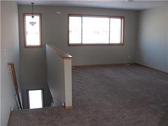 living room with good sized windows.