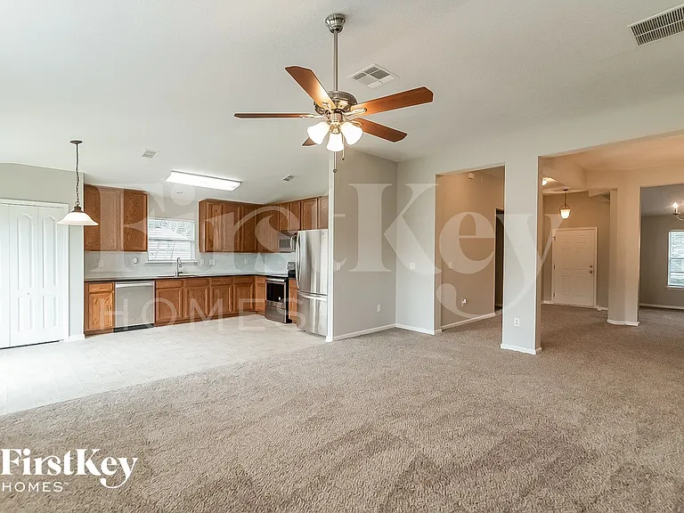 2878 Woodstone Dr — Photo 4