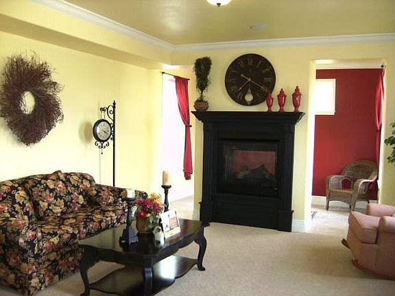 Beautiful Living room with 2 sided fireplace that opens to sunroom