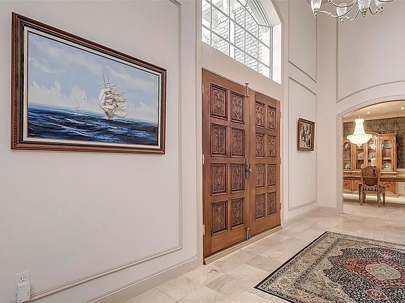 Intercom system at front door, gracefully designed elegant Foyer! Entry with expansive  travertine floor.