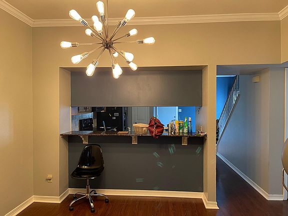 Spacious dining between living room and kitchen
