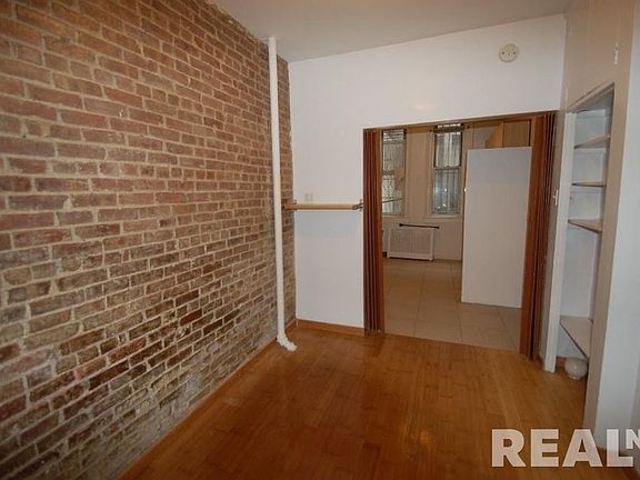 2nd image of 226 E 3rd St APT 1E