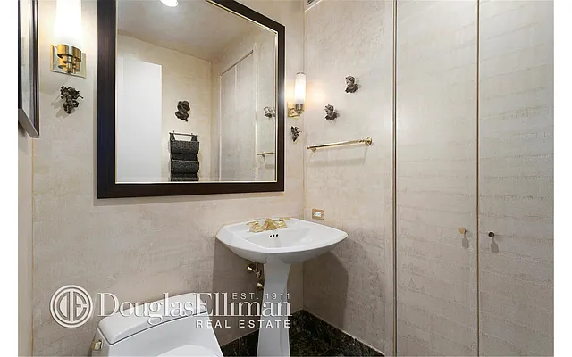 Sold by Douglas Elliman | media 18