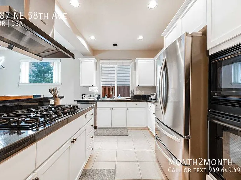 487 NE 58th Ave — Photo 7