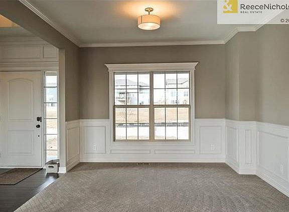 Formal dinning room. Energy-Star rated double pane vinyl windows with low-e glass. Shaw Green Edge carpeting and Sherwin Williams superpaint with low V.O.C paints and sealants were used for healthier indoor air quality.