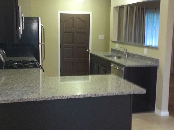 Kitchen looking from dining area