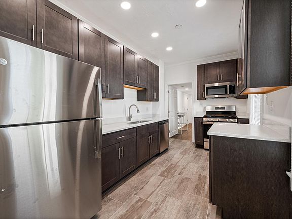 Kitchen new appliances, counters and cabinets