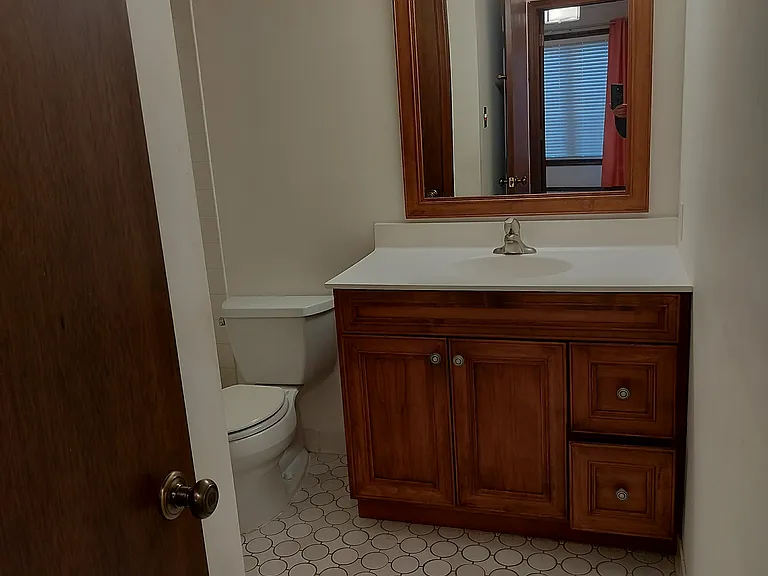 Newer vanity, countertop, faucet, mirror and light fixture. New toilet. Has a linen closet too.