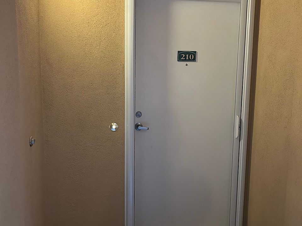 Front door to the unit 210