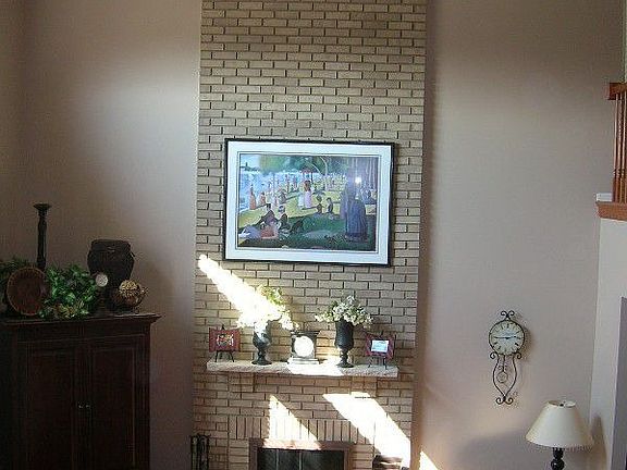 Living rm with 2 story fireplace