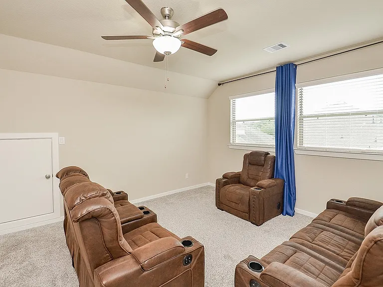 Loft upstairs. Very spacious. 1, 2 and 3 seater fit perfectly with plenty of space. Grand style windows let in natural light.