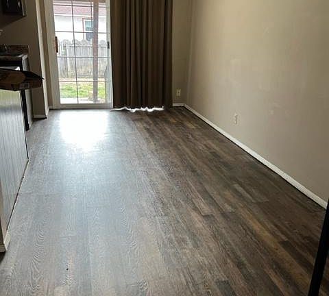 Dining area to patio - with new vinyl plank flooring