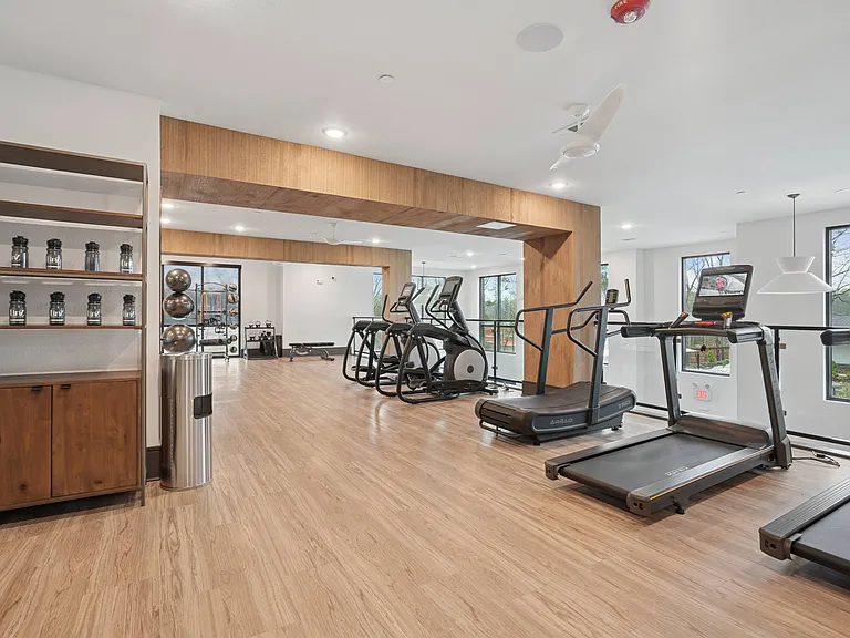 Yoga Room with Treadmills and Free Weights