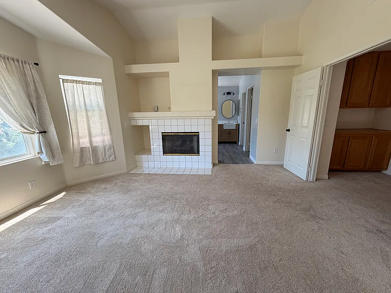 Primary bedroom with fireplace.