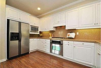 Updated counter tops/back splash with stainless steel appliances