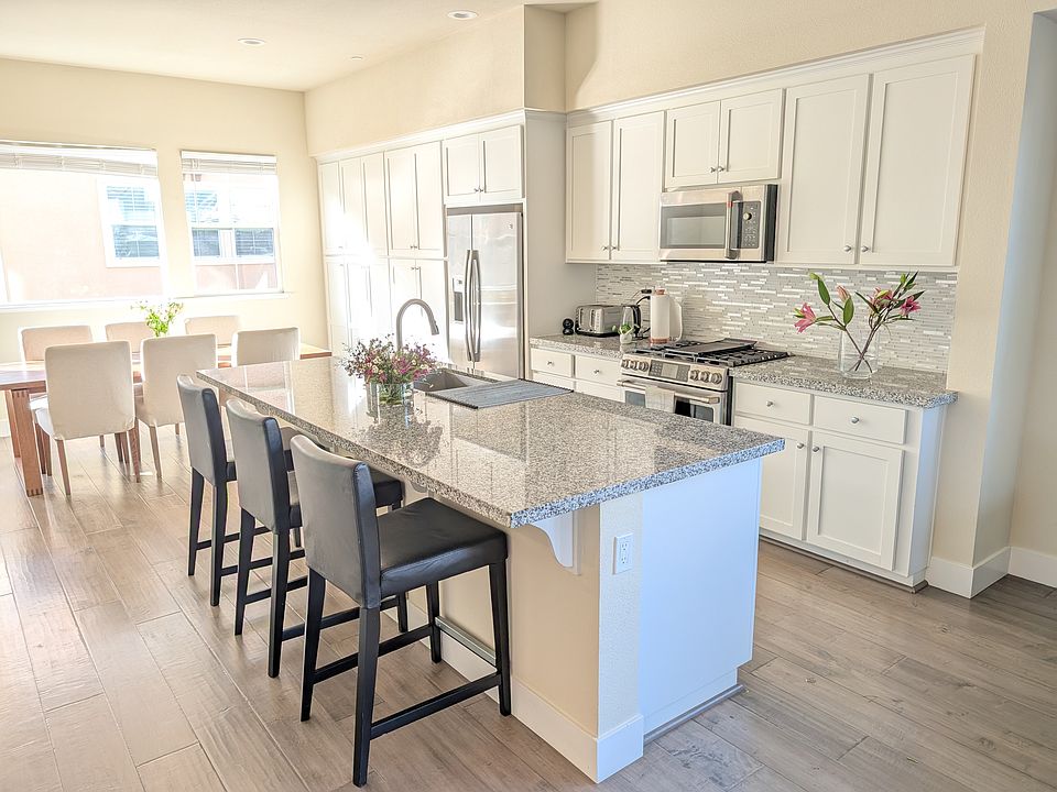 Whole of the 2nd floor is one large great room with living, kitchen and dining.