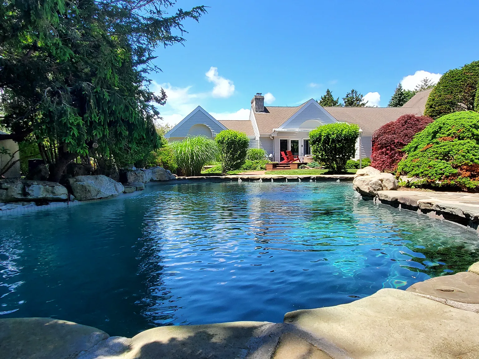Remsenburg Summer Rental | Pool & Tennis | Water access — Photo 1