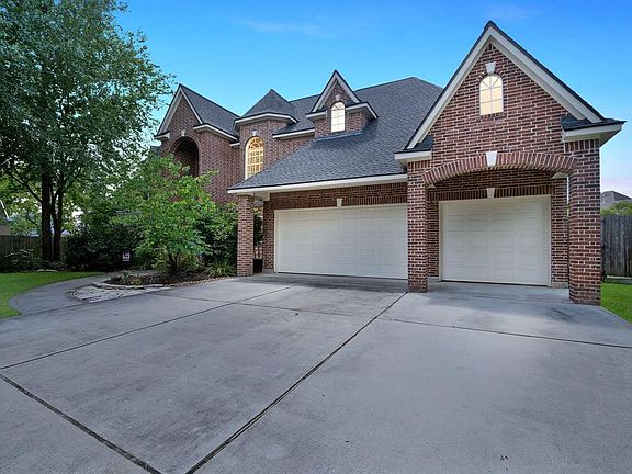 Great curb appeal on this custom, all brick 2-story custom