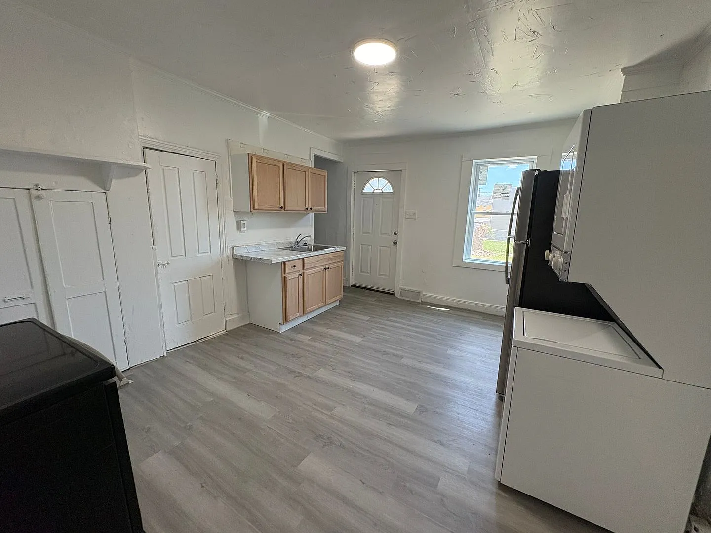 Newly Renovated Two-Bedroom, One Bathroom Row Home - Move-In Special! Get $700 Off Your Second Mo... — Photo 2