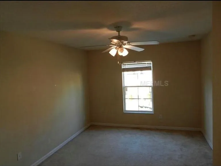 2nd bedroom w old flooring