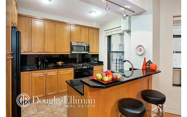 Sold by Douglas Elliman | media 12