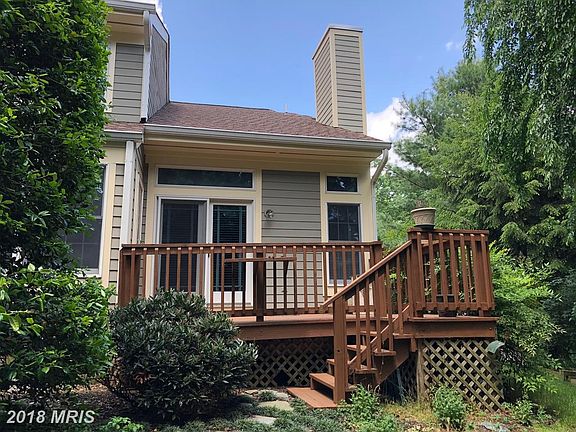 Very private back deck overlooks parklike setting.