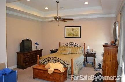 Master Bedroom View 1 : His and Hers Closets and sitting area