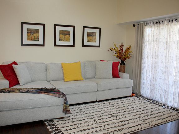 Living room with sliding doors to balcony