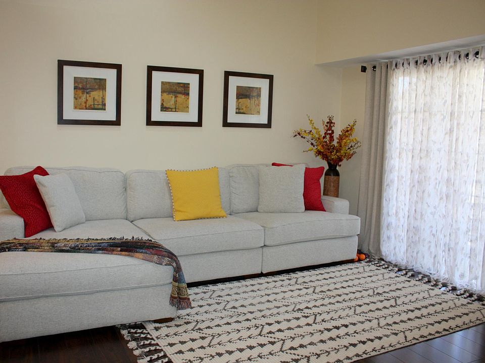 Living room with sliding doors to balcony