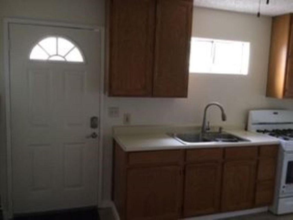 Entry door and kitchen