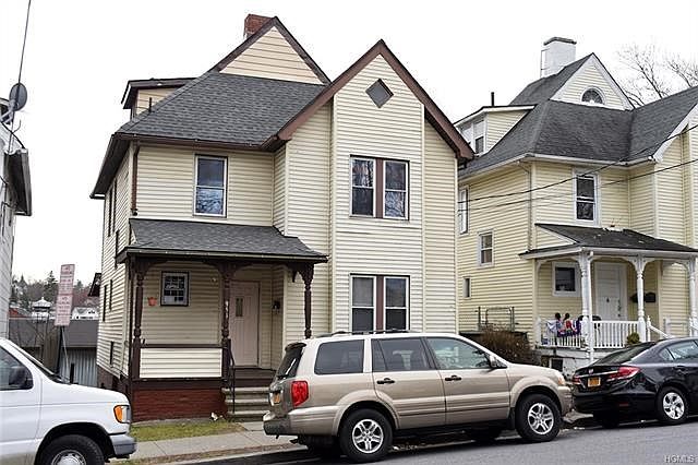Maintenance free front porch colonial home.  Vinyl siding, new roof 2013.