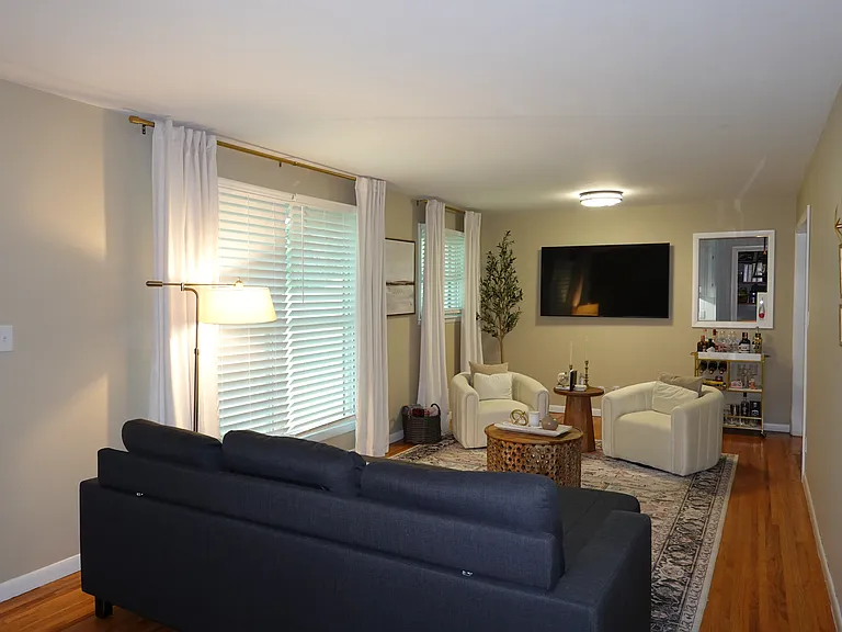 Natural hardwood floors, new windows provide great natural lighting, and modern upgrades made throughout the house.