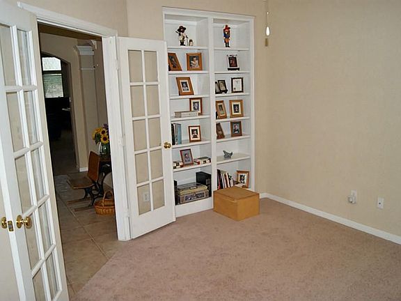 STUDY WITH BUILT-INS AND FRENCH DOORS