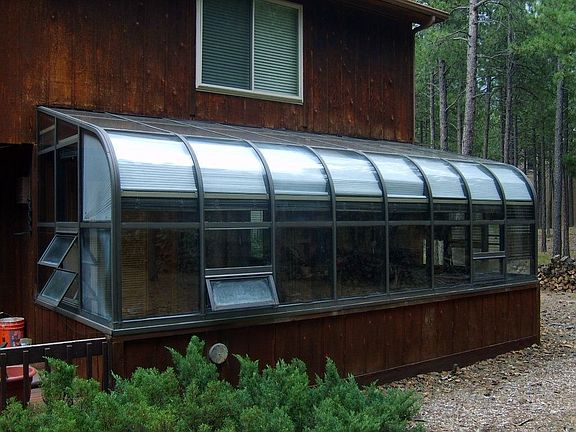 Sun Room and Back of Home
