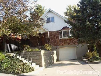 Curb Appeal - Beautiful Cape Cod
						:
						Gorgeous Brick Cape Cod Home - New Stone Wall, Driveway and Steps
