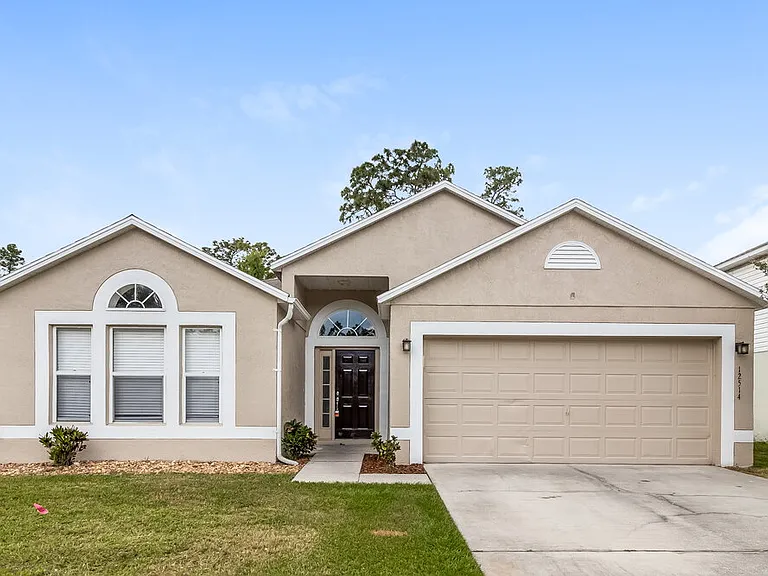 12514 Woodbury Cove Dr — Photo 1