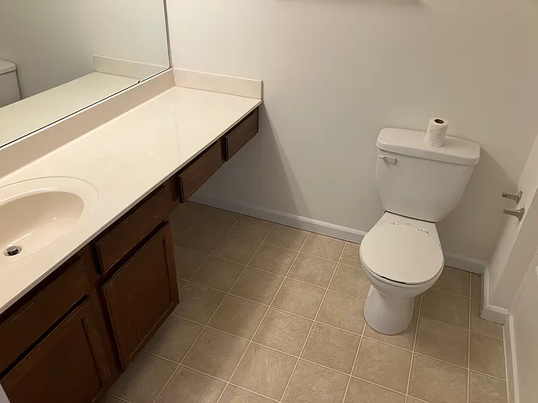 Hall bath is equipped with a tub/shower.