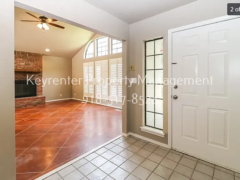 7737 S Trenton Ave — Photo 2