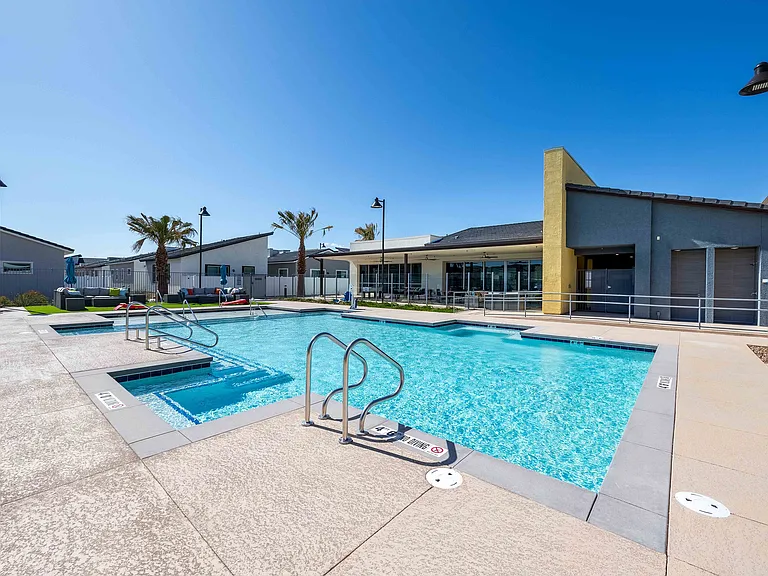 Experience relaxation and luxury by the pool in this stunning residential community.
