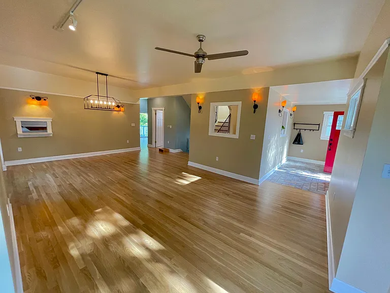 Entry and great room, bright and gorgeous Swedish finish white oak, refinished in 2022.