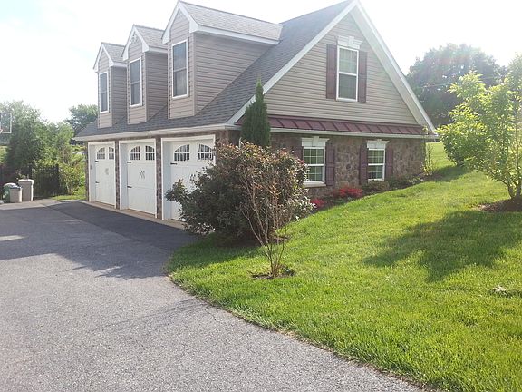 Dettached 3 car garage & gym